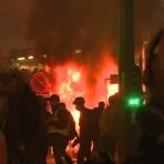 Fires, tear gas and arrests after yellow vest protest in Paris