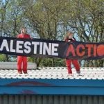 Pro-Palestinian-protesters-on-the-roof-of-the-Israeli-owned-arms-factory