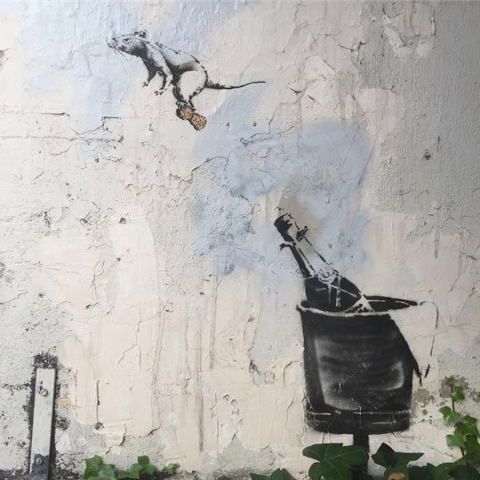 Banksy champagne bottle rat