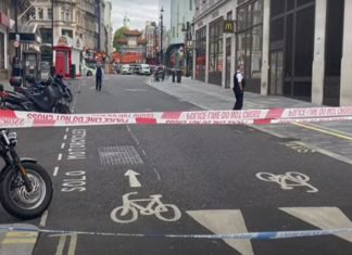 Police officer seriously injured and another hurt after attack in central London police officers stabbed