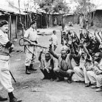 British-colonial-officers-stand-guard-Kenya