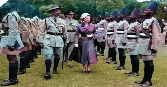 Queen Elizabeth II inspects the Nigerian Army