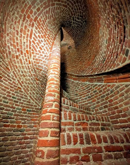 The famous brick spiral staircase in Moot Hallβ